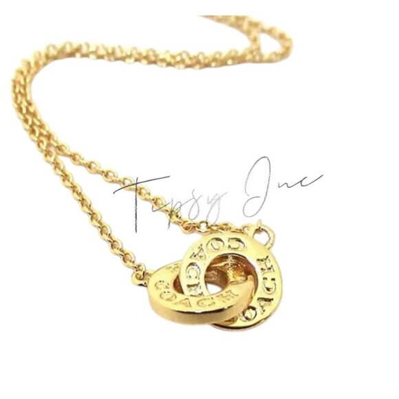Coach Gold-Tone Interlocking Signature Pendant Necklace - Picture 2 of 5